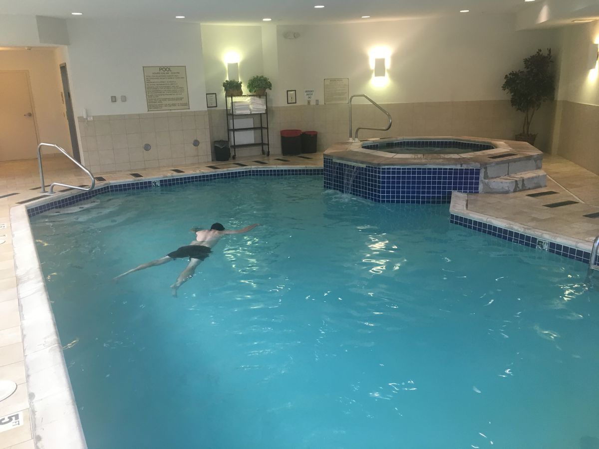 Swimming laps in an indoor hotel pool